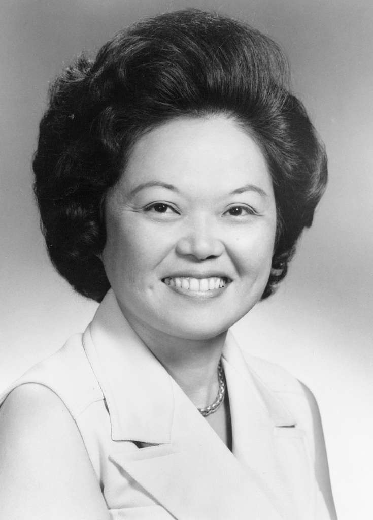 Black and white headshot of Patsy Takemoto Mink, smiling warmly with a confident and approachable expression.